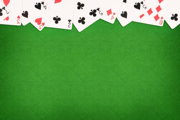 Live blackjack table with dealer and cards in professional studio setting